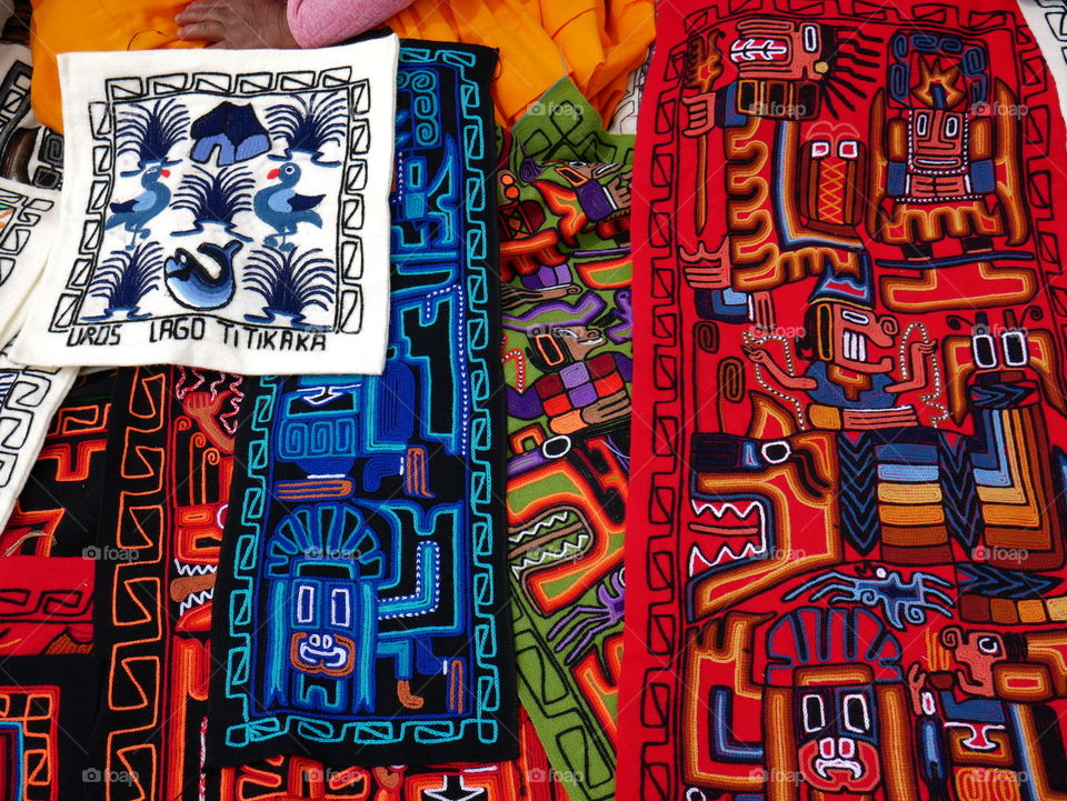 Colorful embroidery on local market in Peru