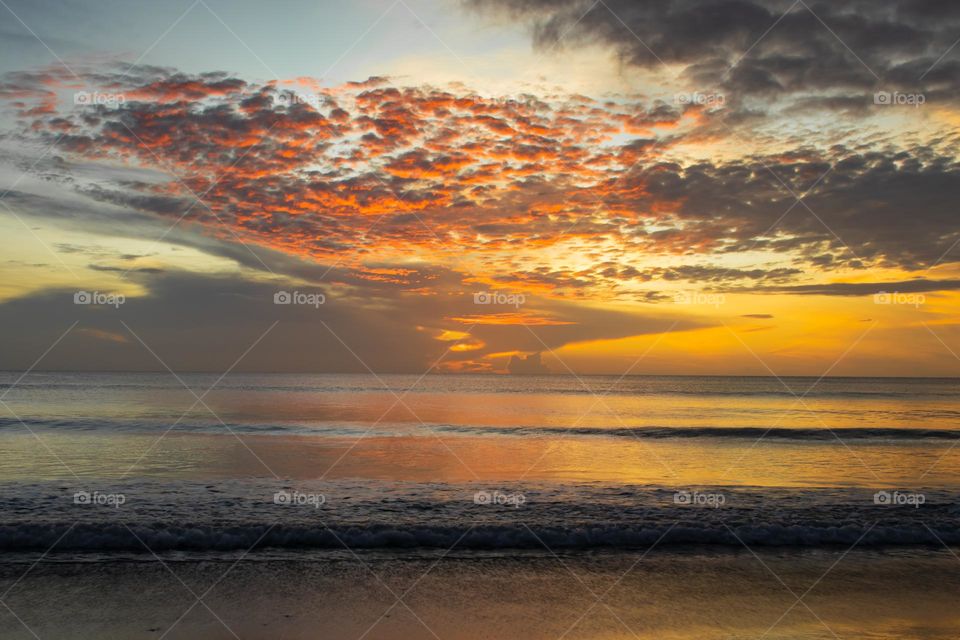 Every cloud has a silver lining. sun rising in the eastern part of Sri Lanka with colourful clouds