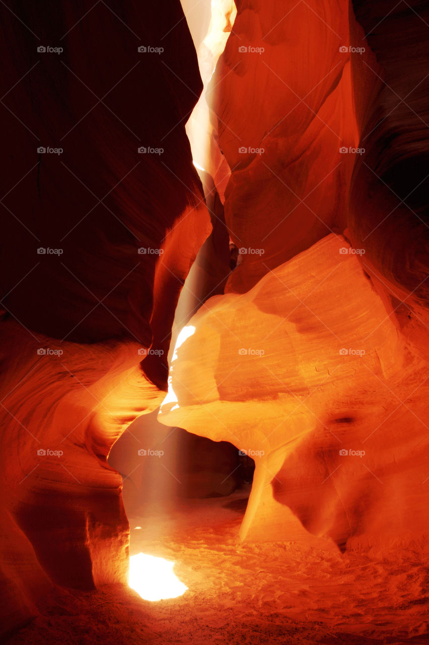 Amazing light beam through sphinx shaped canyon