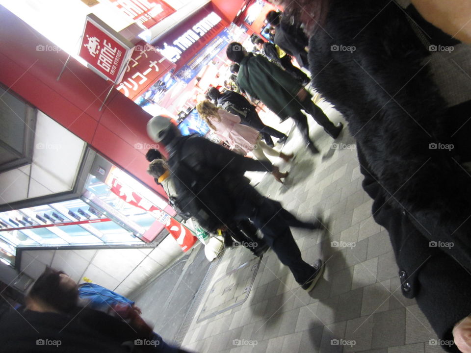 Akihabara, Tokyo, Japan. People Walking at Night. Fashion and Trends.