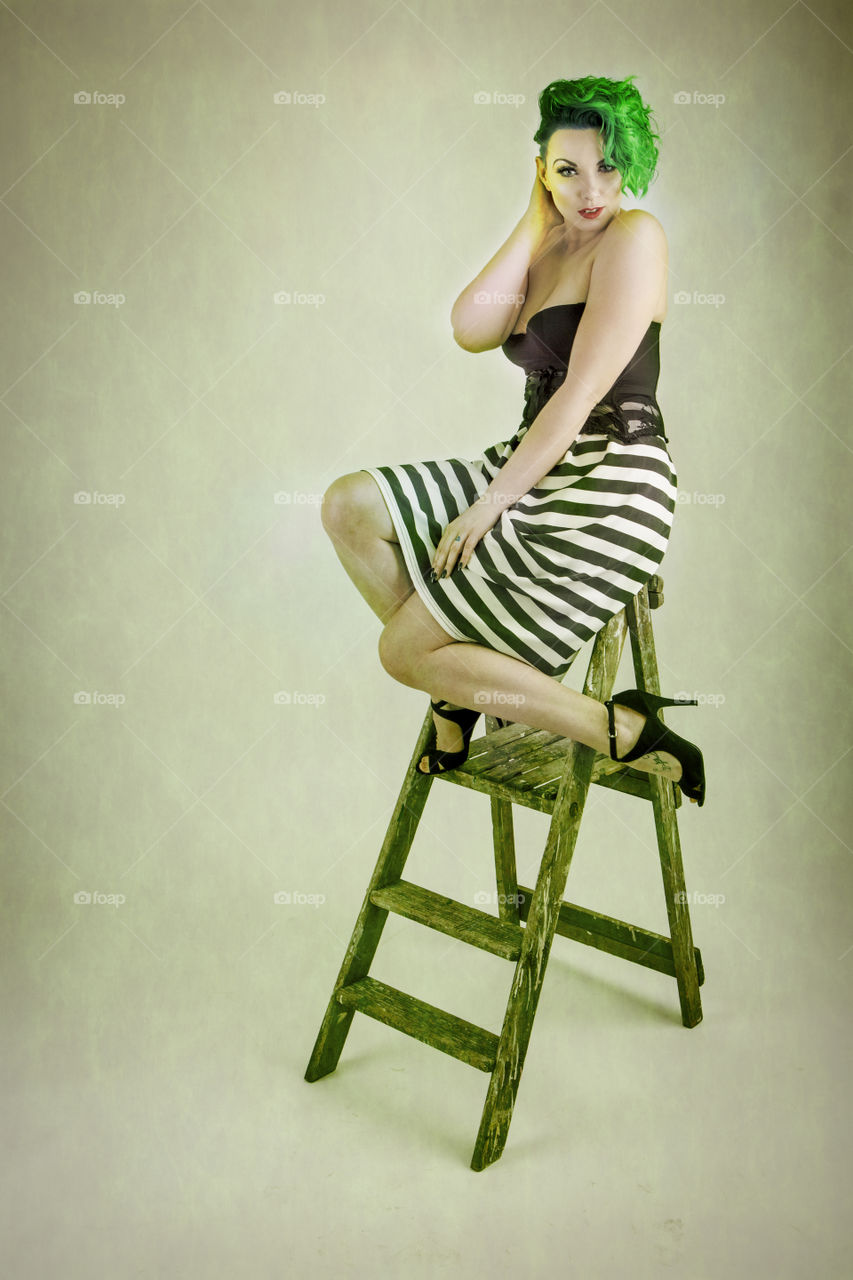 Taken posing on step ladders this photograph was shot 1960s style