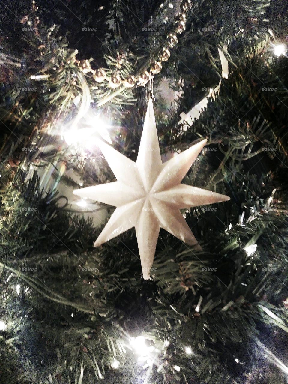 Bright shining white star Christmas ornament