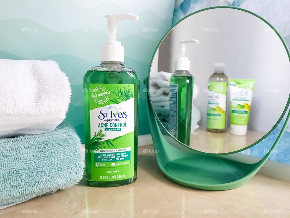 Product photo- Using a mirror to show other same brand products in the background in the mirror.