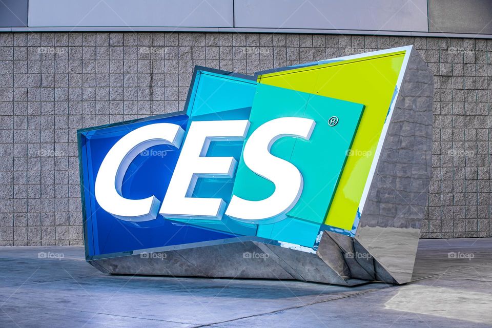 Las Vegas, NV 1-6-2023: Large logo of CES outside the entrance of LV Convention Center. Held annually, CES is the largest consumer electronics convention in the world. Vibrant cool colors on the sign.