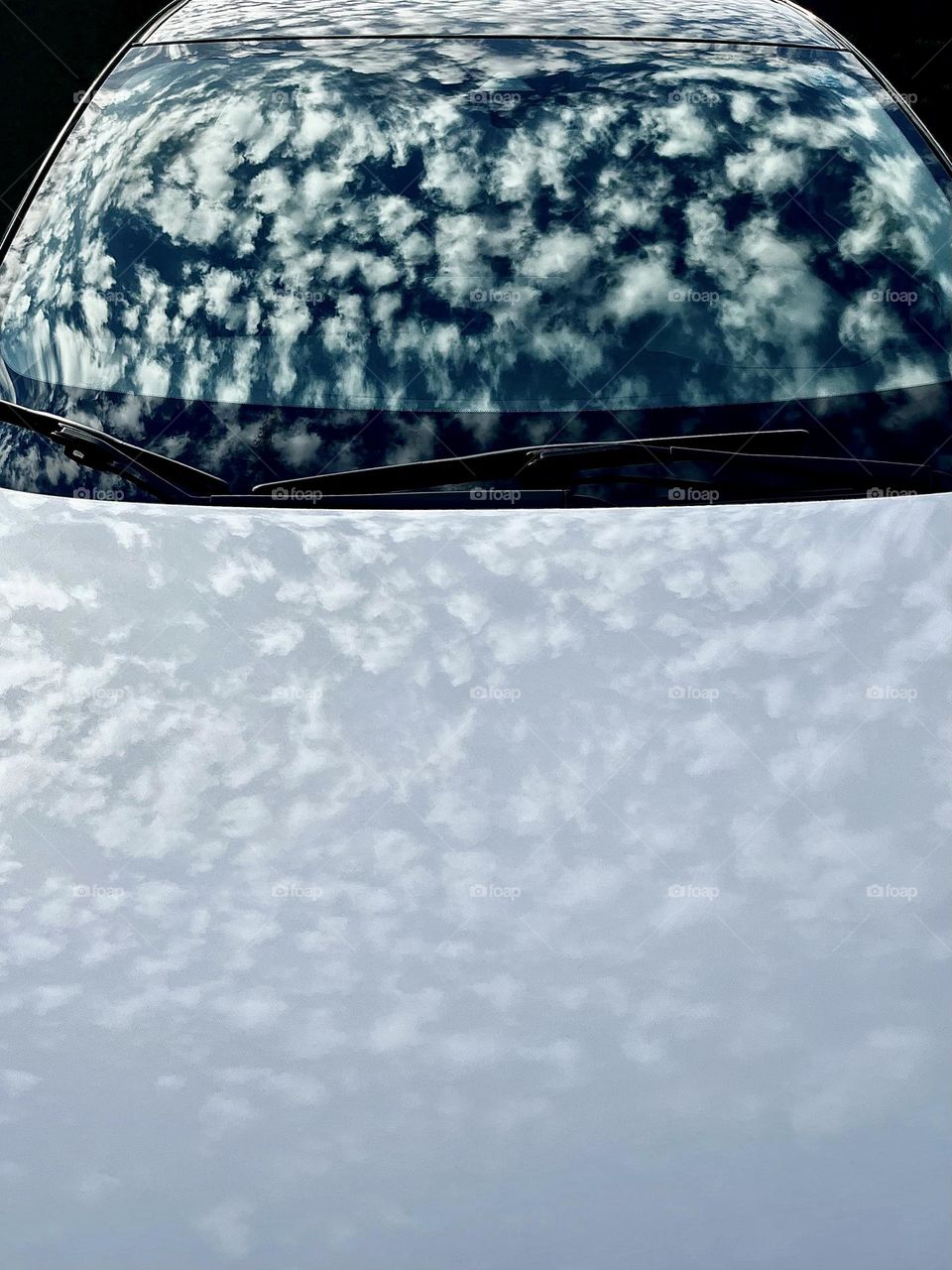 White Car with Clouds Reflection 