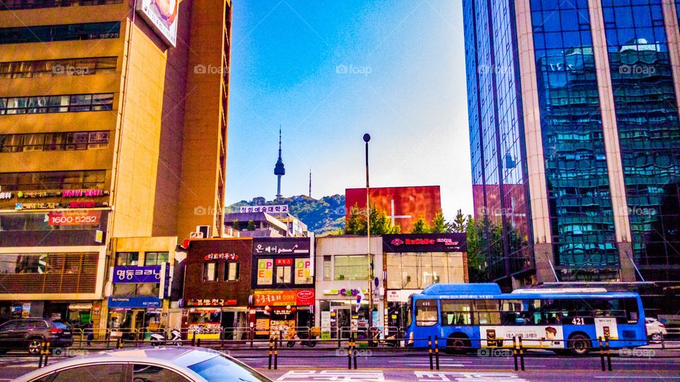 Seoul tower namsan tower Ntower photo taken from myeongdong street in Seoul Korea where youngsters go shopping, dating
