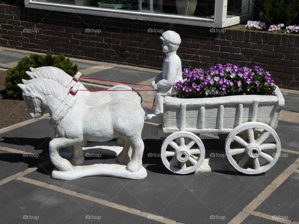 statue of horse and carriage