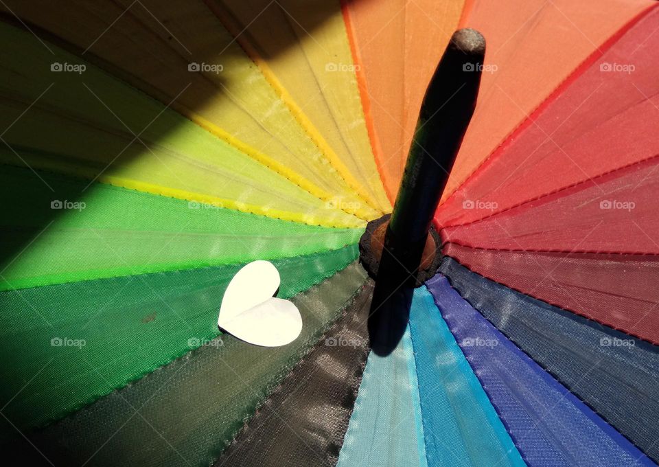 white love sign on colorful umbrella