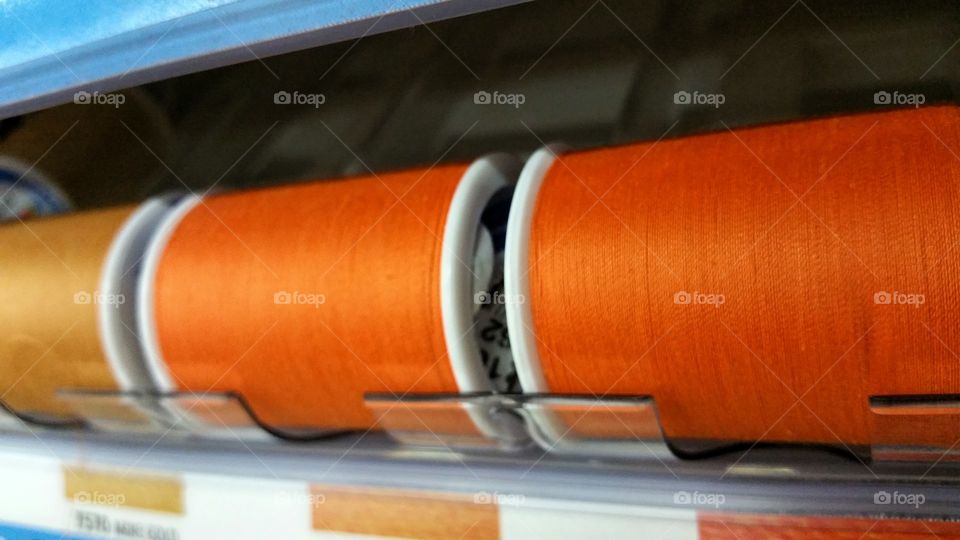 Orange sewing thread