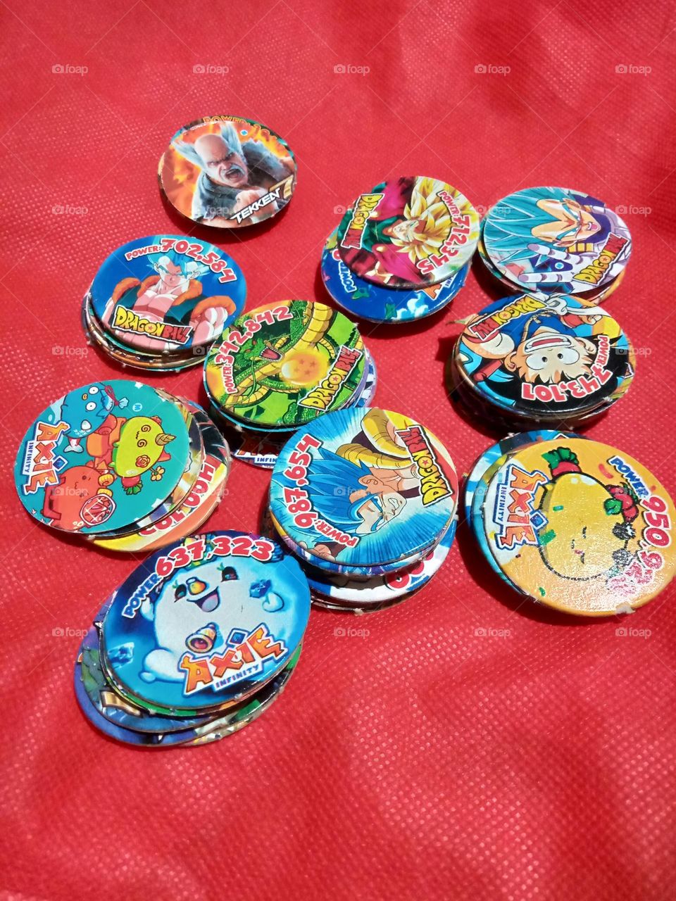POGS TOY IN CIRCLE SHAPE, WITH ASSORTED FACIAL CHARACTERS, PLAYED BY BOYS AND GIRLS,,
