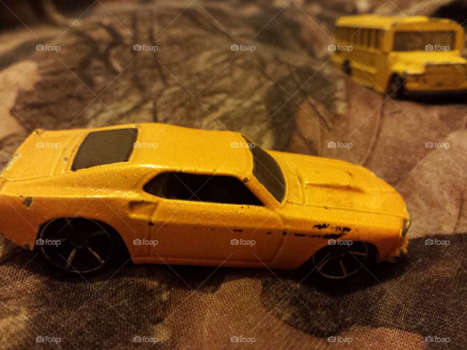 yellow . toy cars