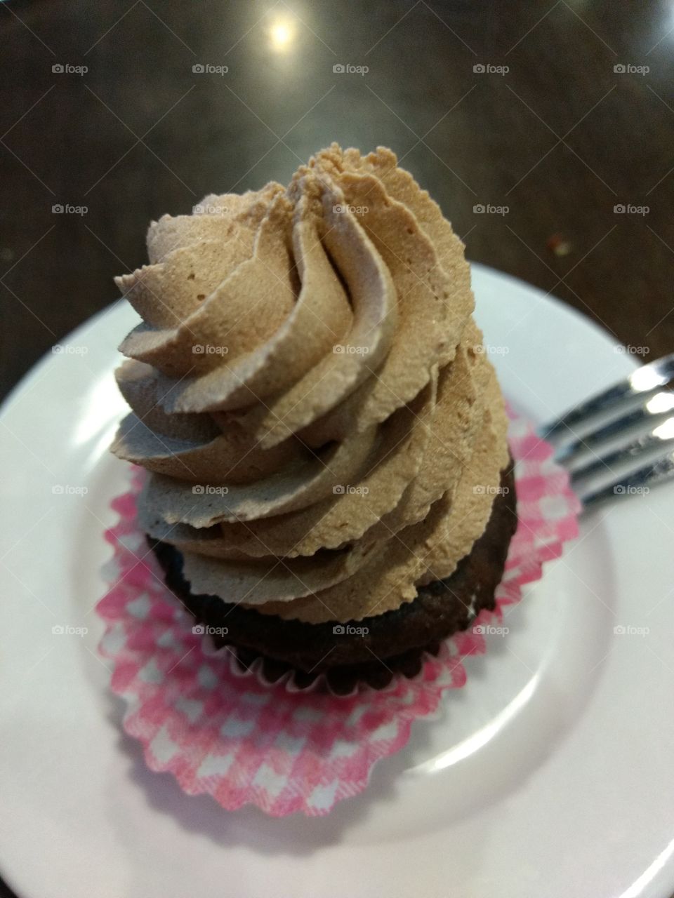 chocolate frosted cupcake