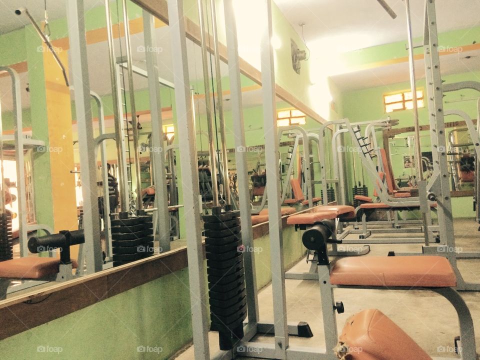 gym equipments and mirror reflection 