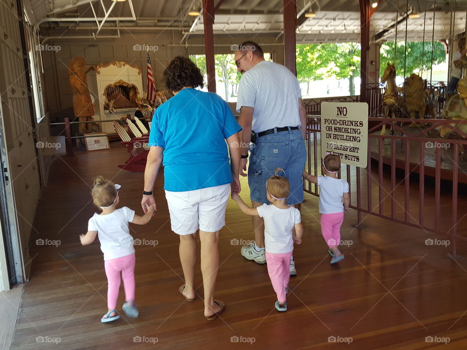 Three times the fun, three times the giggles and three times the memories are made with triplets on this day at the park to ride on the carousel.