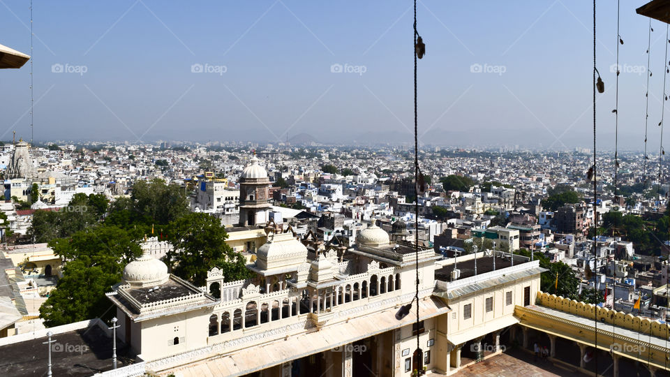 Udaipur, Rajasthan, India May 2019 - The beautiful panoramic landscape Aerial view of Udaipur City skyline. Lots of buildings can be seen in distant.