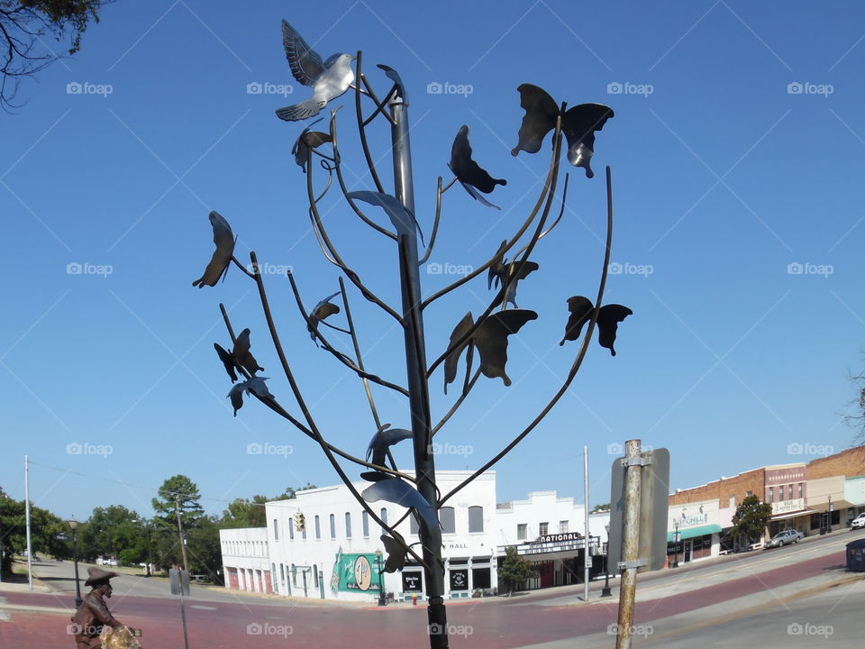 free bird 🐦. This is a picture of some artwork that is on display in front of the local library in Graham Texas. 👣 🚶 🏃 🔥 💨