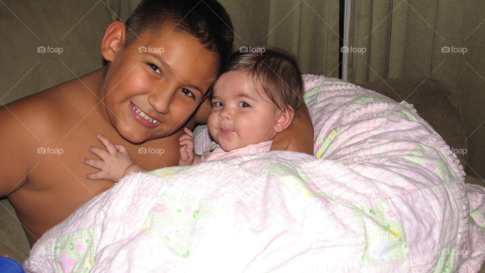 Brother can protect his little sister from
Anything with his charming smile