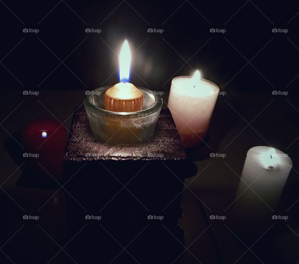 Four burning candles 