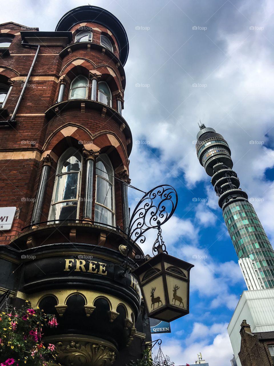 Low angle view of tower in city