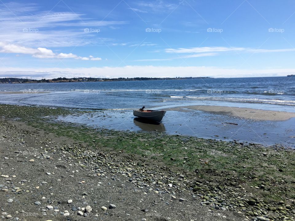 Boat moored at beach