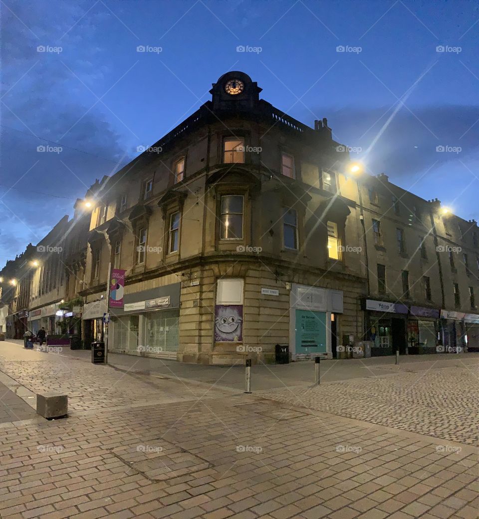Old building with a clock in the evening