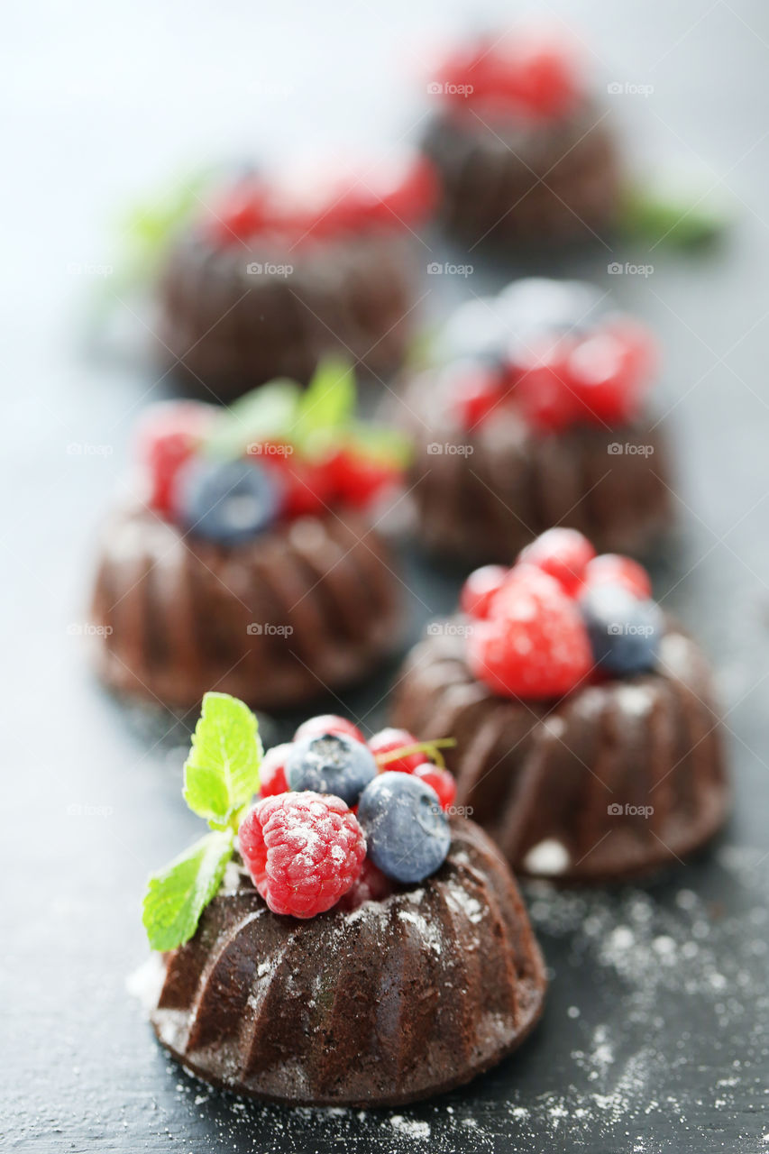 Chocolate muffins with berries