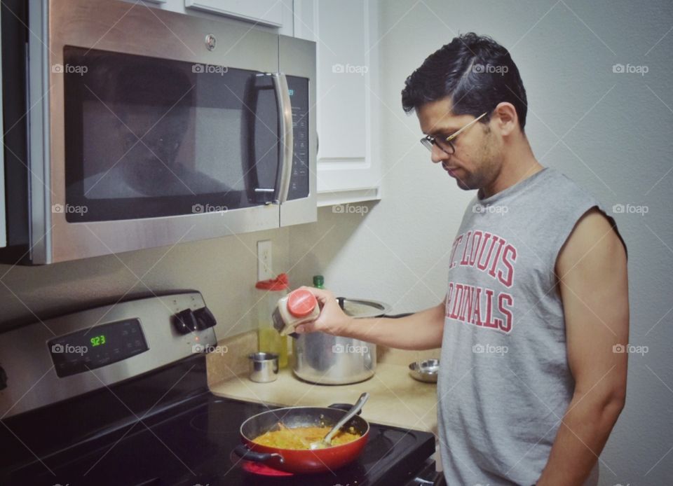 man cooking dinner 