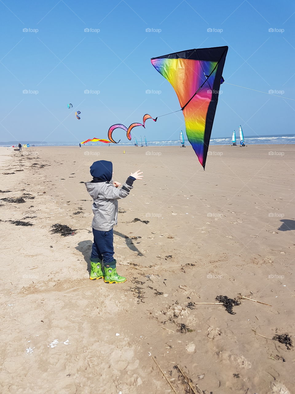 Flying a kite at the beach