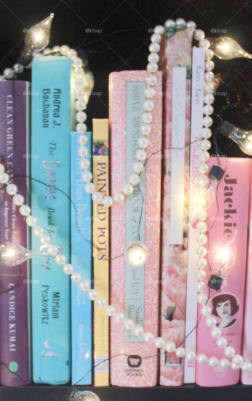 Pastel Girlie Books, pearls, and lights