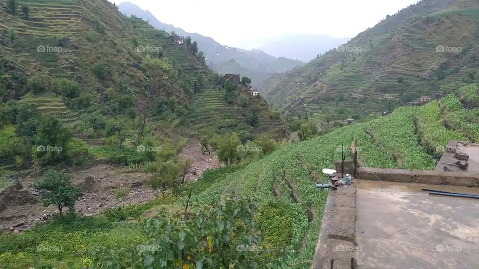 Glory be to God, the magnificent and picturesque view and the natural green trees are a view that is nothing more wonderful than it