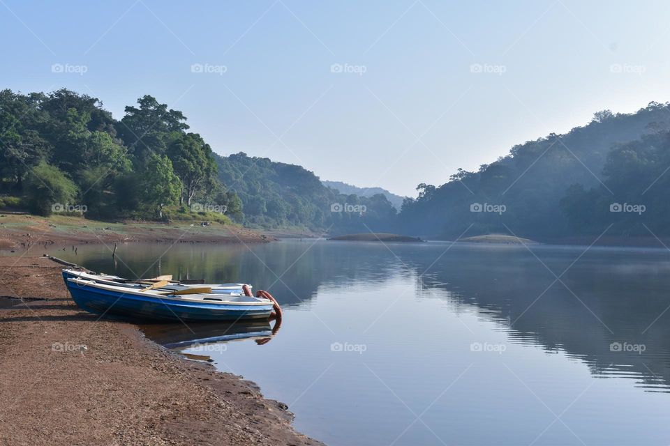 panoramic view of lake with boats, beautiful view of lake in forest
