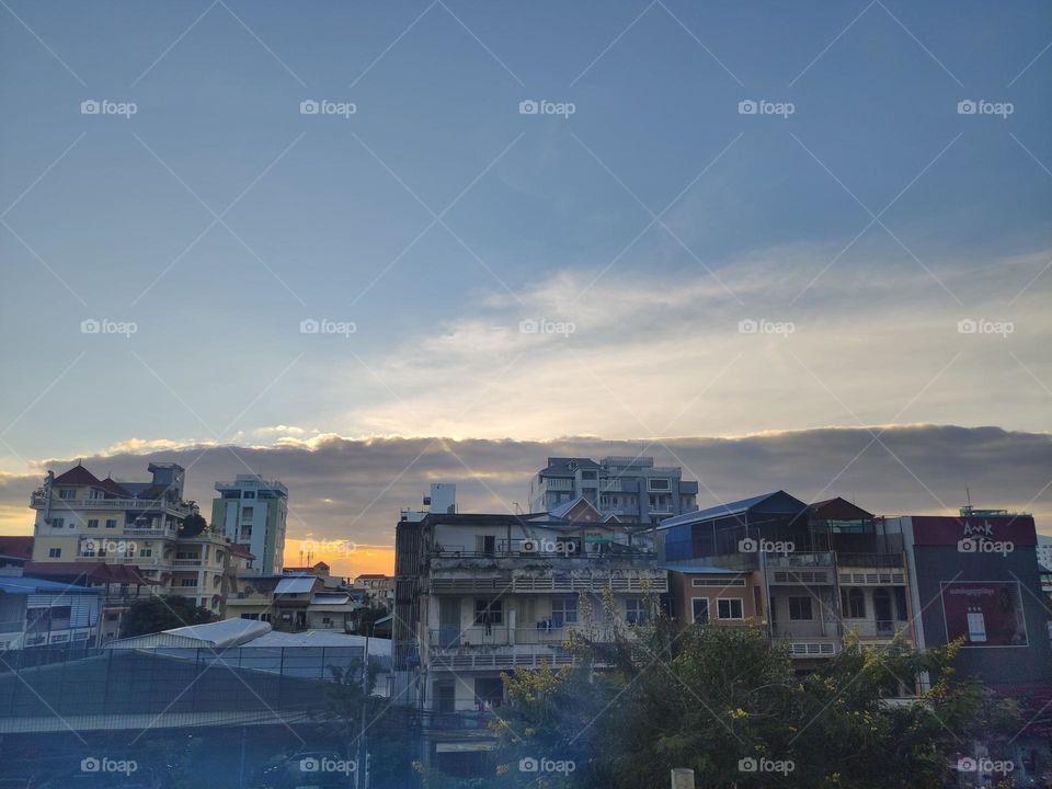 Sunset with a bed of clouds in my neighborhood at Prampi Makara Phnom Penh Cambodia