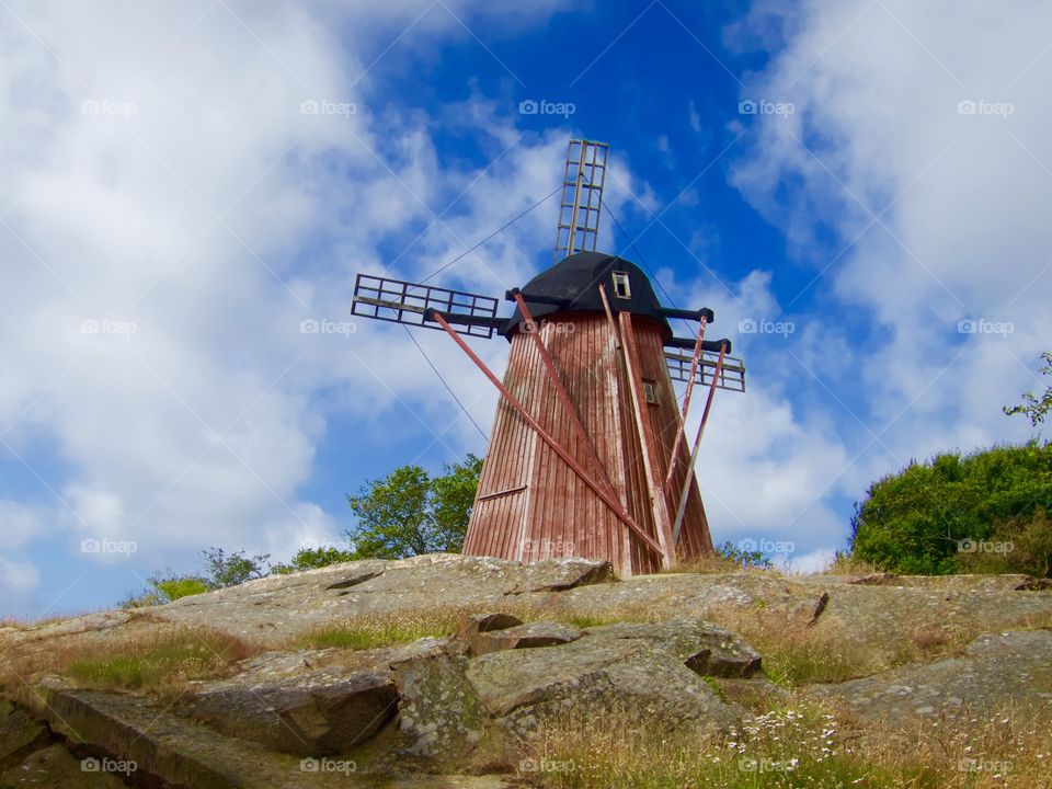 Old windmill. Old wooden windmill. 