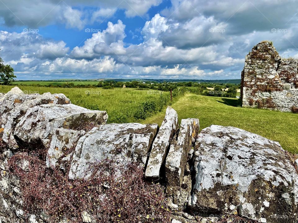 A view of the countryside from a rock wall at the Hill of Slane, County Meath, Ireland.