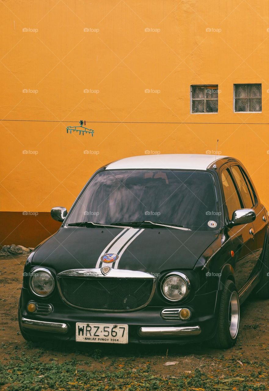 beetle car on an orange background