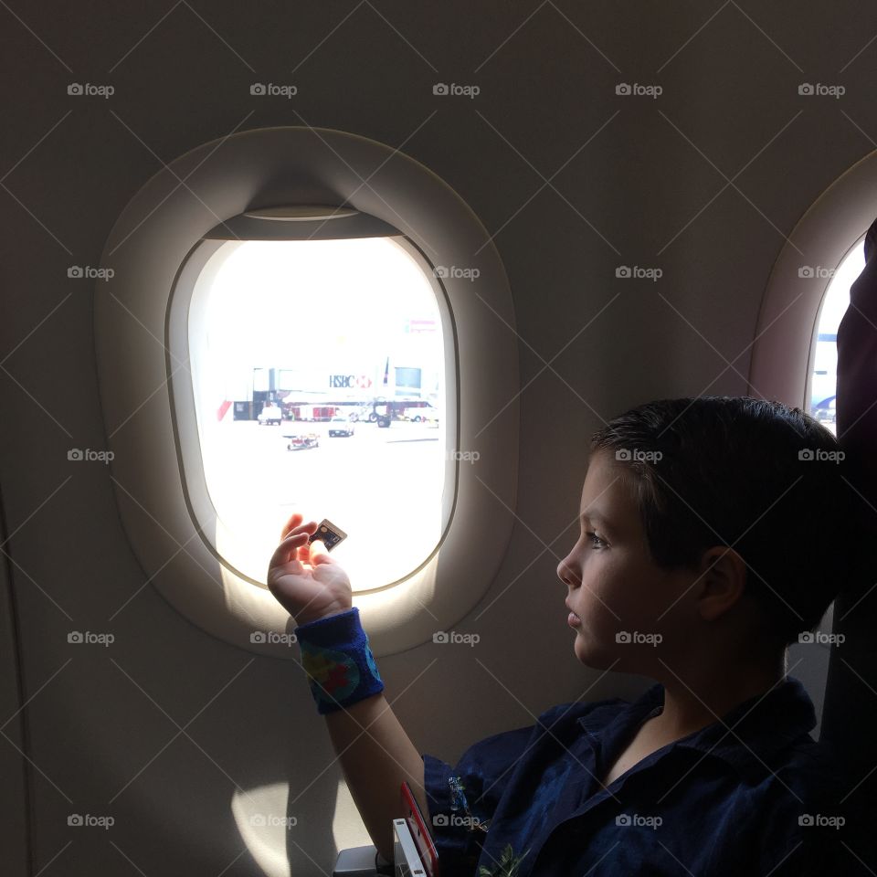 My son is autistic, I want to share this picture to express how I feel when we travel with my son with disability.
Physically he looks like a normal person, he does not have any physical evidence of disability.
When we travel to Mexico and the USA is incredible the lack of education in airplanes, immigration, airports and in our society.
Is incredible how human values are not longer part of
Our society. Is very important to educate our kids and our selfs to be sympathetic, helpful, solidarity, compassion, patience, tolerance, amiability to the ones suffer the most, the one who needs us the most. 
Airlines and immigration are not educated enough to understand autistic individuals. Are rude, question me , were is his disability.... I have to teach them that disability does not mean wheelchair, mental disabilities are in the brain!. Not visible!!.
My son is an adorable kid, very caring, behave much better than typical individuals, he  feels for others when are hurt he feels
Sympathetic for others, how is that typical people are not sympathetic?.
He need extra space when we travel, just to have a little more space in case he needs to realize anxiety. My son is on verbal so he can not express his feeling as  "typical" comunícate verbalizing.
Airplanes are not keeping any seats for seniors or for individuals #FOAPNATION
With disabilities. Is more powerful making money selling the seats that make it someone feel like a human. We are forgetting that human been can think and use the brain and we are letting animal instincts to take control of our brain and behave like a human.

Love someone with Autism!.

