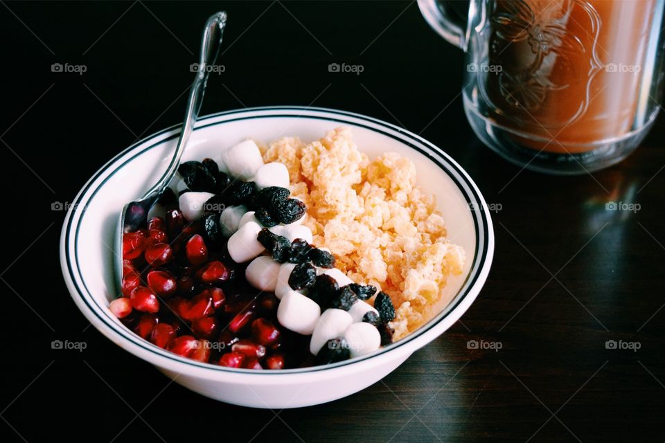 Pomegranate seeds, marshmallows, raisins, & rice Krispy treats cereal 