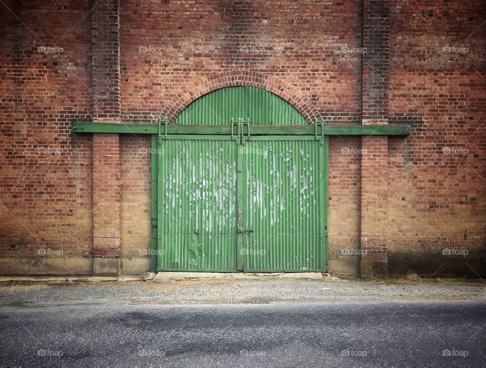 Warehouse door with peeling paint