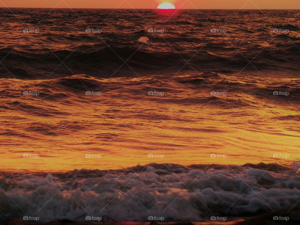 The sky is beautiful but the sea is angry.