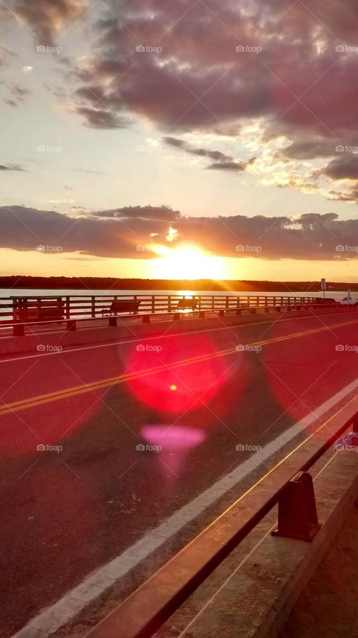 Capturing sunsets is, probably, a universal desire. This is no exception for this girl