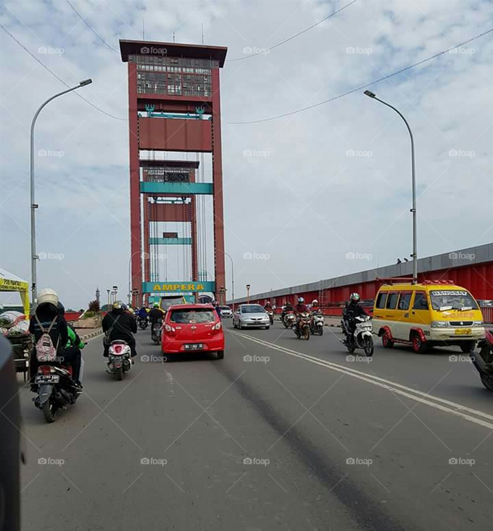 The Ampera Bridge is the main icon of Palembang Indonesia, the Ampera Bridge stretches over the Musi River, which connects two separate regions, namely Hulu and Hilir.