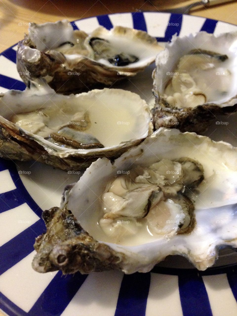Fresh oysters on a plate