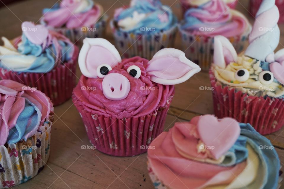 Tasty cupcake on table