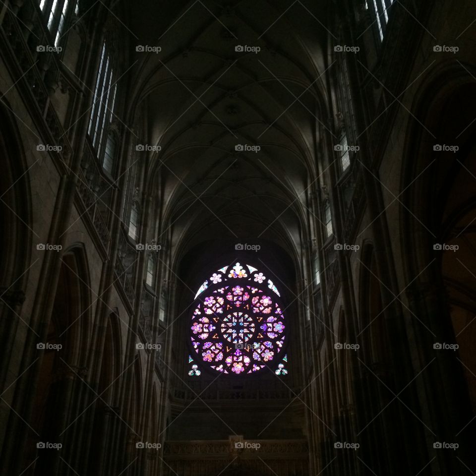 Beautiful purple Stained Glass window located within the Prague Castle, Czech Republic