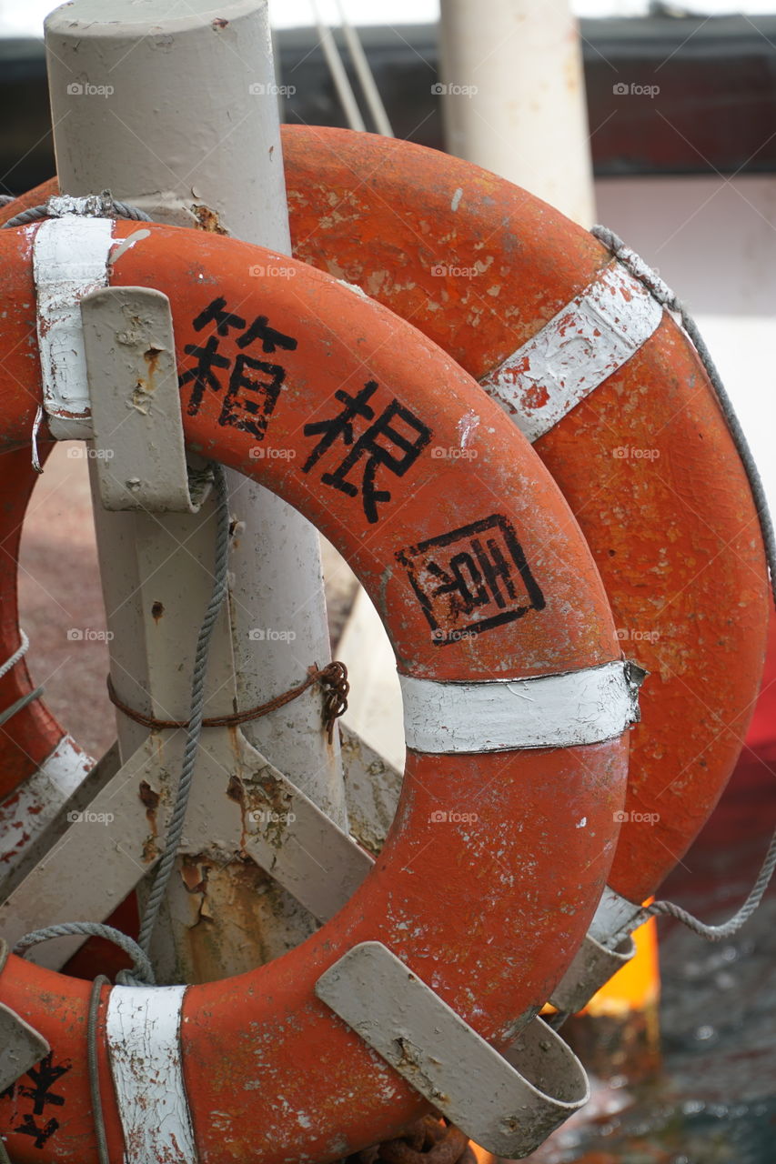 Two orange Life preservers