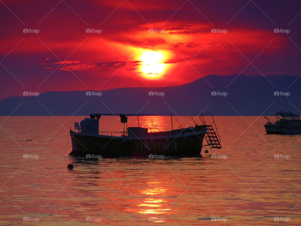 Sunset over Praia beach (Italy)