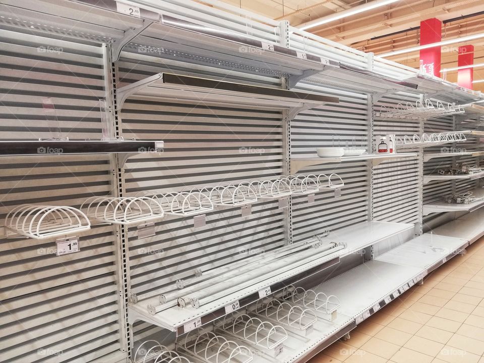 Empty supermarket shelf