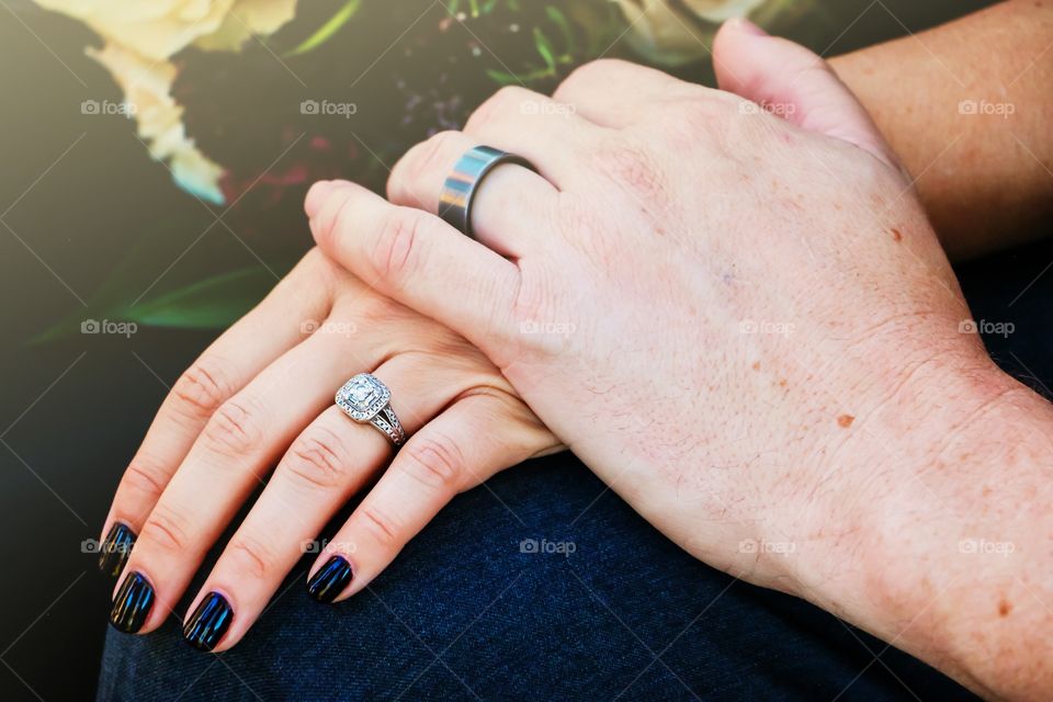 Bride and groom holding hands