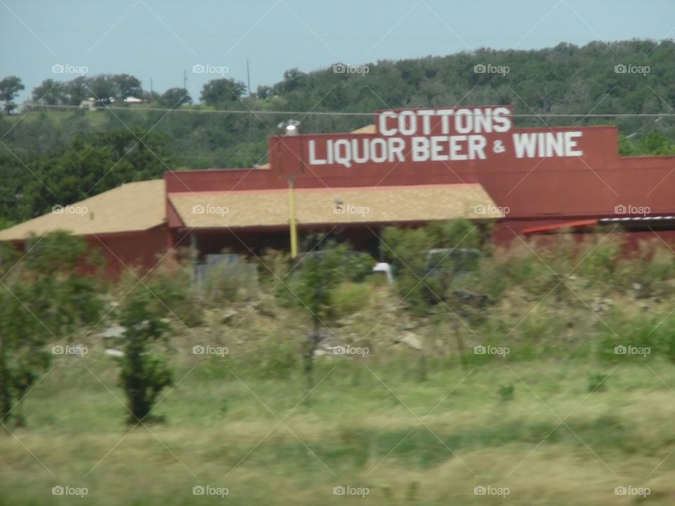 cotton licker. This is a picture of a liquor store located in between Graham and Jacksboro Texas