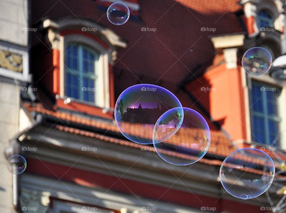 soap bubbles on the building background